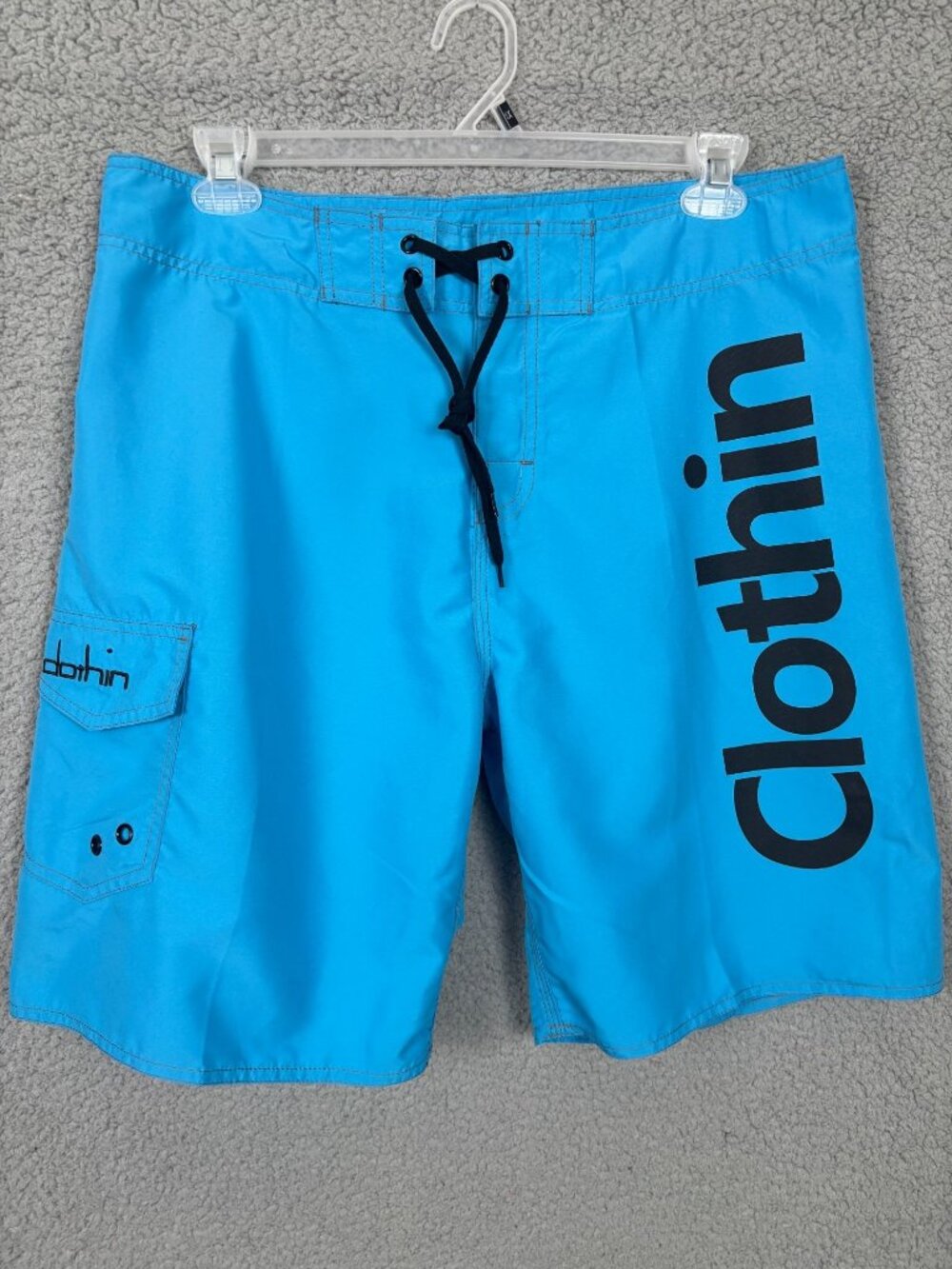 Clothin  Men's Blue w/Black Graphic  Beach/Board Shorts 9" Size 34. NWOT's.